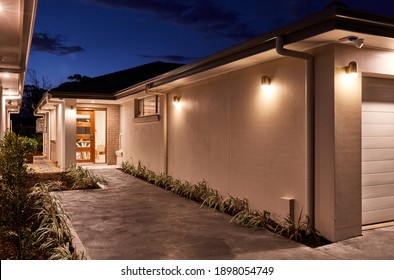 Exterior Dusk Images Of A Granny Flat Studio Residence At The Side Of A Suburban Home