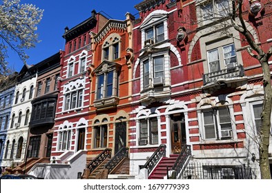Exterior facade of colorful brownstone apartment buildings, Upper West Side, Manhattan New York