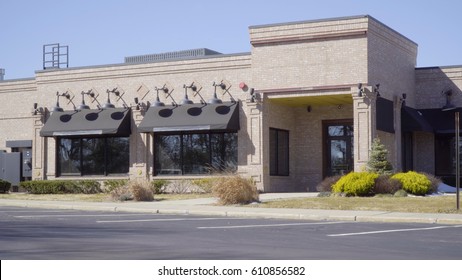 Exterior Generic Restaurant Diner Establishing Photo Day Time. Tight Shot Of Front Entrance With No Signage For Stock Use