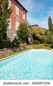 Exterior Of Italian Villa In Tuscany With Swimming Pool. Day Of Great Sunshine