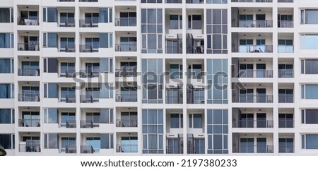Similar – Image, Stock Photo Residential building facade full frame view.