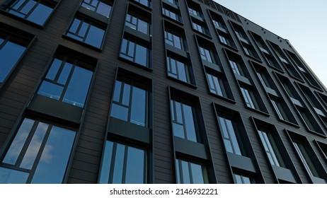 Exterior of modern dark house object. Architectural detail of a skyscraper, close-up on the windows. Real estate, residential apartments and offices. Living apartments or office building architecture. - Shutterstock ID 2146932221