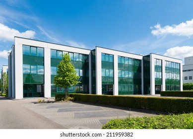 exterior of a modern office building - Shutterstock ID 211959382