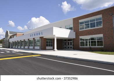 exterior of a modern school building entrance - Shutterstock ID 37352986
