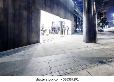 Exterior Of A Modern Shopping Mall At Night