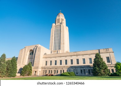 Exterior of the Nebraska Capitol Building in Lincoln against a blue sky