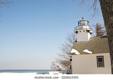 Exterior Of Old Mission Lighthouse In Traverse CIty, Michigan In Winter.