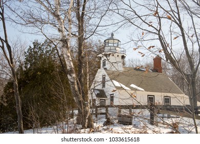 Exterior Of Old Mission Lighthouse In Traverse CIty, Michigan In Winter.