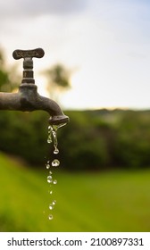 Exterior Old Water Faucet Dripping