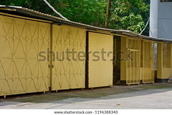 An\
exterior of part a car garage isolated unique\
photo