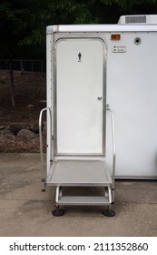 Exterior of a portable men's restroom trailer.                                