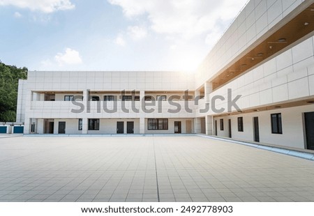 Similar – Image, Stock Photo Balconies of a new building block in the countryside with a red parasol / balcony