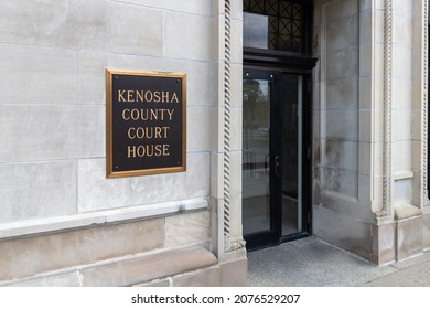 Exterior Sign Of Kenosha County Court House.  Posted On White Marble Wall Near Entrance.  Outlined In Gold With Black Background.