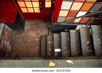 Exterior Steps Lead To Underground Basement Apartment On City Street