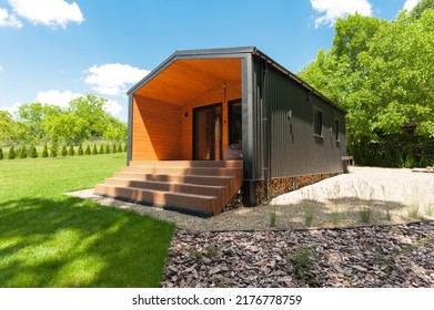 exterior of a suburban compact modular cabin for family vacations - Shutterstock ID 2176778759