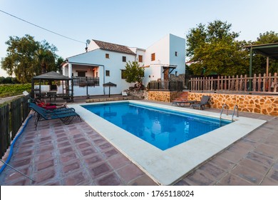 Exterior Terrace Of A Rural Rental House With Pool In Spain.