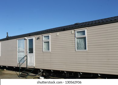 Exterior of trailer home in caravan park.