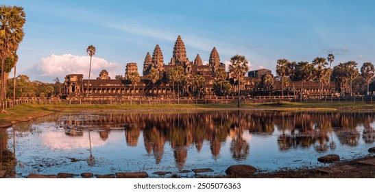 Exterior view of Angkor Wat, largest Hindu and Buddhist religious monument in the world. UNESCO World heritage site located at SIEM REAP, Cambodia - Powered by Shutterstock