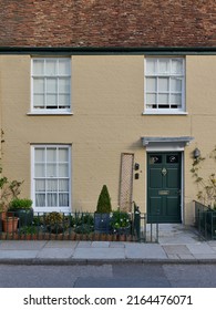 Exterior View Of A Beautiful Old Cottage House On A Street In An English Town