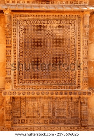 Exterior view of carved window on historic fort wall in Jaisalmer, India