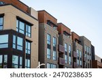 Exterior view of modern apartment building offering luxury units in Silicon Valley, San Francisco Bay Area, California. New construction apartment  or condo complex