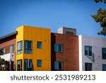 Exterior view of modern apartment building. New construction apartment or condo complex. Modern new residential apartment house building complex