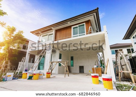 Exterior view of new house under construction and painting.House Painting in morning