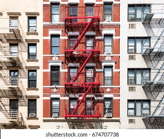 Exterior View Of Old Apartment Buildings In New York City NYC