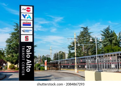 Exterior View Of Palo Alto Transit Center. Signpost With Names Of Public Transportation Transit Services - SamTrans, Caltrain, VTA, Dumbarton Express - Palo Alto, California, USA - 2021