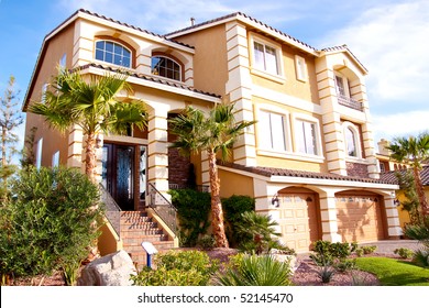 Exterior view of a stucco house - Shutterstock ID 52145470
