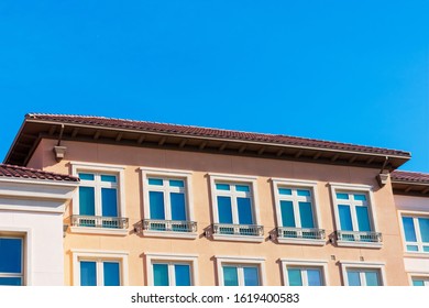 Exterior View Of Typical New Mid-rise Multifamily Residential Building Without Balcony. The Buildings Are Usually Rental Apartments, College Dorms, Condominiums, Assisted-living Facilities.