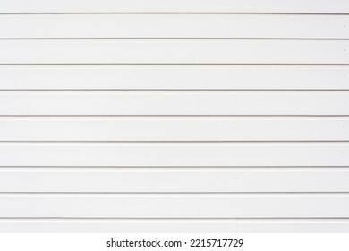 Exterior Wall Of A Shop In White Painted Wood Slats