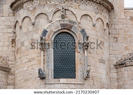 Exterior window of a romanesque church in Trani, Southern Italy