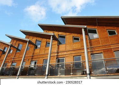 Exterior Of A Wooden Terraced Apartment Building