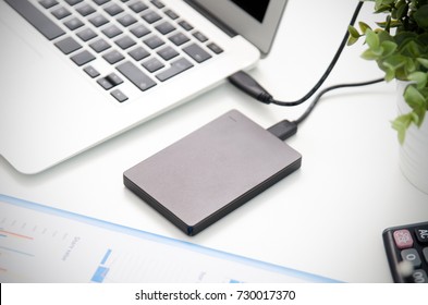 External Backup Disk Hard Drive Connected To Laptop. Hard Drive Backup Disk External Computer Data Usb Concept