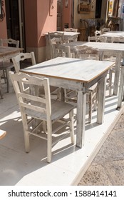 External bar wooden table view - Shutterstock ID 1588414141
