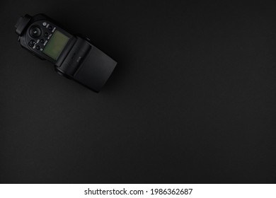 external camera flash isolated on a black background