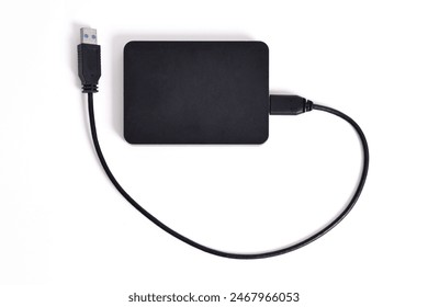 External Hard Disk drive with usb cable isolated on white background. External HDD with usb connector
