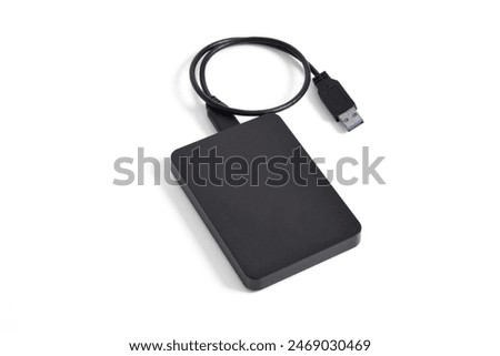 External Hard Disk drive with usb cable isolated on white background. External HDD with usb connector