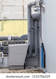 External infrastructure of the microclimate support system at a large industrial site. Air pipelines inlet and exhaust. Fans and air conditioning. Systems of control of pressure, humidity, temperature