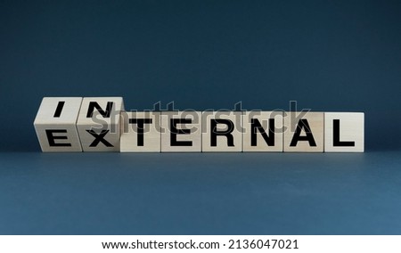 External - internal. Cubes form the words external - internal. Business Concept