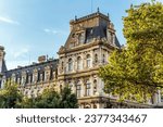External view of the Hôtel de Ville, city hall of Paris, rebuilt in 19th century in French Renaissance style, with statue of provost Étienne Marcel, Paris city center, France
