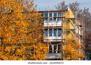 External Wall Insulation During Autumn Season. Solid Wall Insulation. Energy Efficiency House Wall Renovation For Energy Saving.