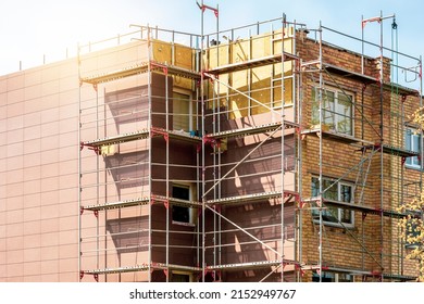 External Wall Insulation During Spring Season. Solid Wall Insulation. Energy Efficiency House Wall Renovation For Energy Saving.