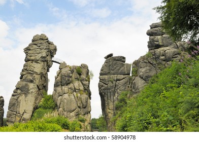 Externsteine near Detmold Germany is a Sandstone formation whose withered shapes have talked to the Mystic sides of Man ever since the Stone Ages. The Rocks have been the Scenery for Cultic Rites.