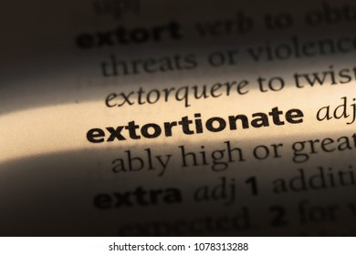 extortionate word in a dictionary. extortionate concept