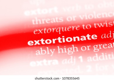 extortionate word in a dictionary. extortionate concept