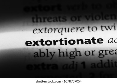 extortionate word in a dictionary. extortionate concept