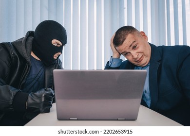 Extortionist Thief Demands Money In The Businessman's Office. Theft Of Personal Data And Information. Bank Robbery. The Concept Of Extortion And Robbery.