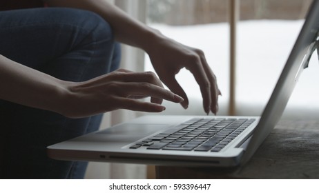 Extra close up of typing work on computer. Typing text on a laptop computer keyboard. Black keyboard key. Networking. Typing message or email on laptop, searching in Internet